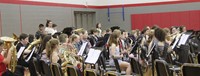 middle school band students performing