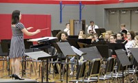 middle school band students performing