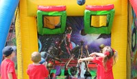 students playing inflatable basketball game