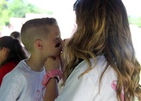 student having face painted