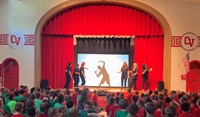 students watching teacher talent show