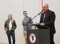 mister tomm presenting students with character counts recognition award