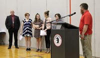 junior varsity girls bowling team members and coach