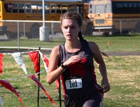 person running at cross country race