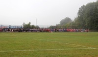 wide shot of runners lined up 