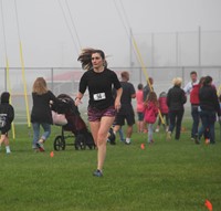 person running at cross country race