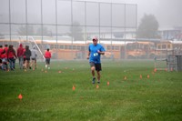 person running at cross country race