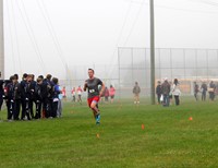 person running at cross country race
