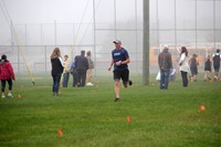 person running at cross country race