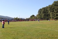 wide shot of people at cross country race