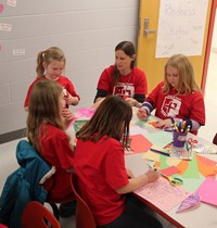 students working at kindness station