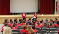 principal speaking at middle school presentation