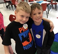 two students smiling