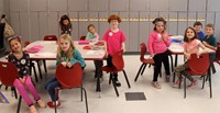 students smiling in classroom