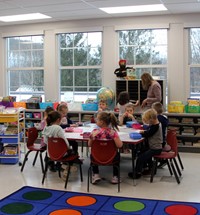 students and teacher in classroom