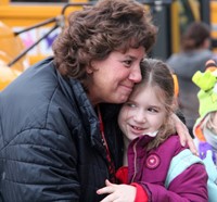 principal hugging student