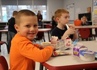 student eating breakfast