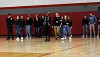 wide shot of high school musical students performing