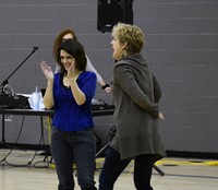 two adults dancing at big gifted give event