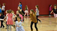 students dancing at big gifted give event