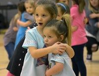 students dancing at big gifted give event