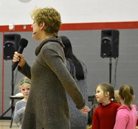 students and adult dancing at big gifted give