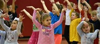 students dancing at big gifted give