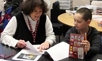 student and adult at writing celebration