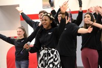 closer shot of high school students singing