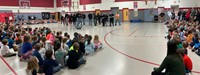 wide shot of high school students giving port dickinson elementary sneak preview snippet