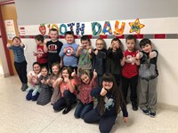 students giving thumbs up for 100th day of school