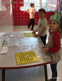 two students taking part in activity