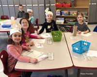 students smiling taking part in 100th day of school activities