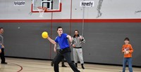 teacher throwing dodgeball
