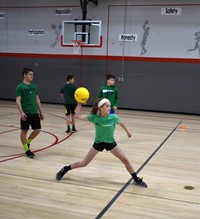 additional students playing dodgeball