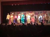 high school students performing on stage