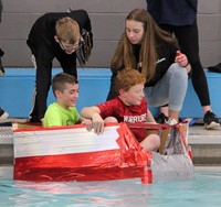 students in boat