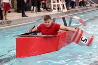 another shot of student paddling boat
