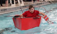 student paddling boat