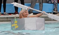 student paddling boat