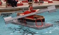 student smiling in boat