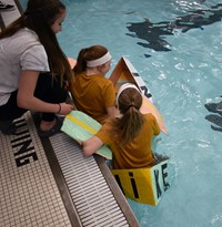 students in boat