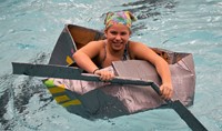 one student paddling