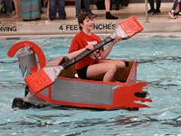 student on warrior boat in the water