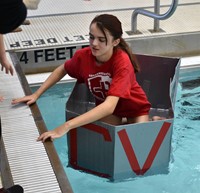 student setting off in boat