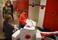 students preparing boat