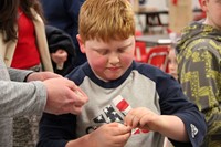 student at steam night station