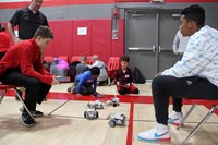 students working with robots