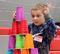 student building with cups