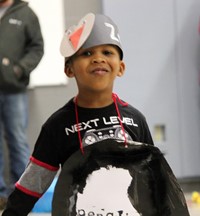 another student smiling in penguin parade